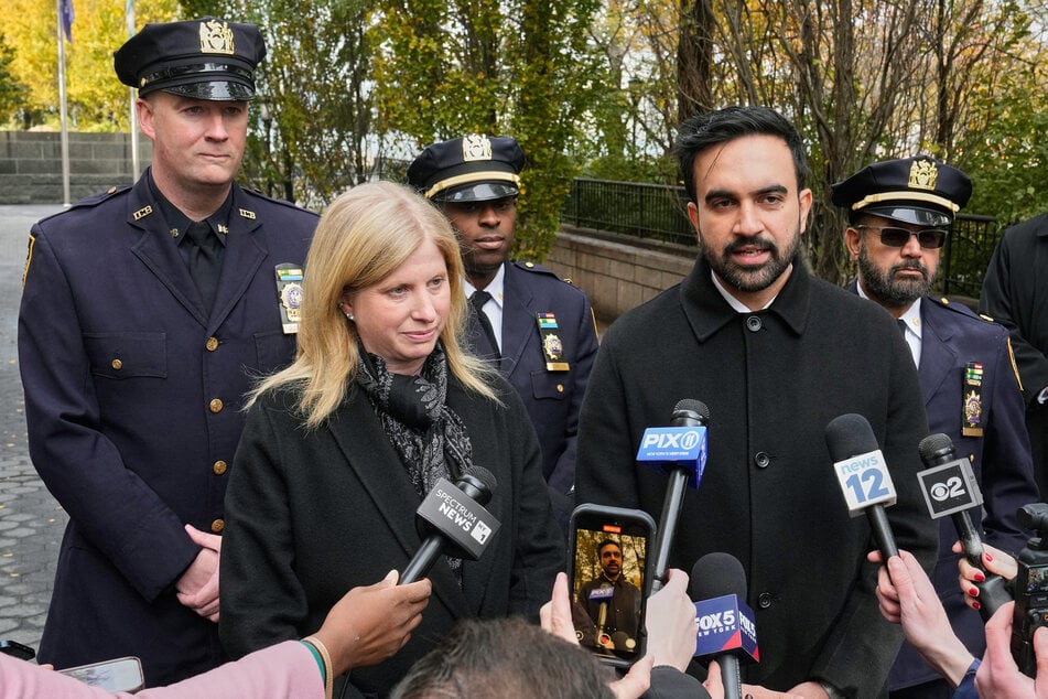 Mayor-elect Zohran Mamdani (front r.) and Police Commissioner Jessica Tisch (front l.) speak during a news conference after their visit to the New York City Police Memorial on November 19, 2025.