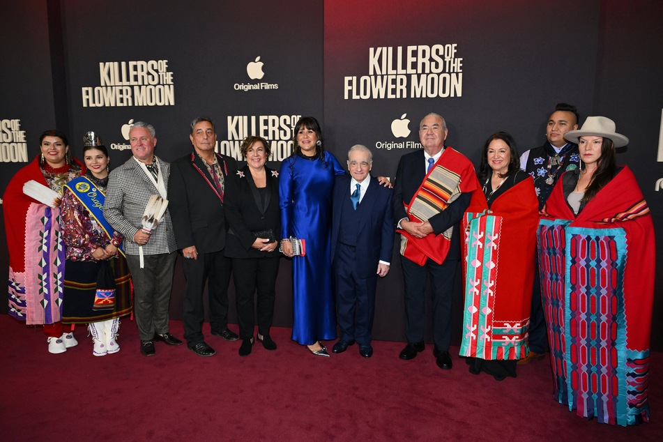 (L-R) Osage Nation Princess Gianna "Gigi" Sieke, Osage Nation Princess Lawren "Lulu" Goodfox, Chad Renfro, Scott George, Julie O'Keefe, Brandy Lemon, film director Martin Scorsese, Osage Nation Principal Chief Geoffrey Standing Bear, Julie Standing Bear, Christopher Cote, and Addie Roanhorse attend the premiere of Apple Original Films' Killers of the Flower Moon at Lincoln Center in New York.