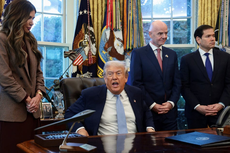 President Donald Trump (2nd from l.) and FIFA head Gianni Infantino (3rd from l.) unveiled an expedited US visa appointment scheme for 2026 World Cup ticket holders.