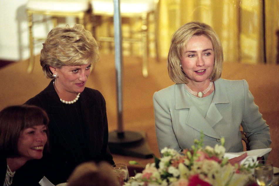 Princess Diana (l.) acted as both a philanthropist and good-will ambassador. Pictured here in 1996 sitting with former first lady, Hillary Clinton.