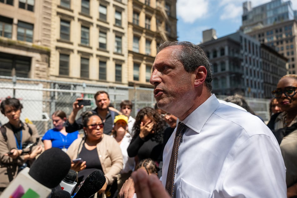 New York City Comptroller Brad Lander speaks to the media after touring the halls of the immigration court at the Jacob K. Javitz Federal Building on July 8, 2025.