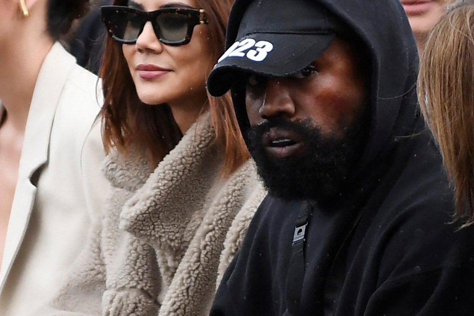 Kanye West wears shirt with white supremacist slogan at Paris Fashion Week