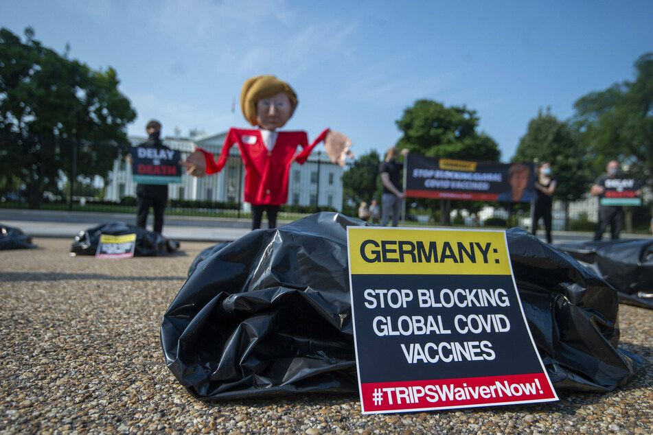 July 2021: Protesters gather outside the White House to demand a TRIPS waiver ahead of German Chancellor Angela Merkel's visit with US President Joe Biden.