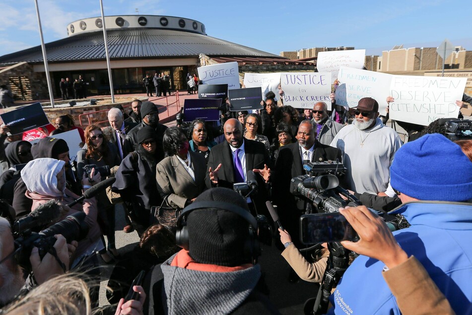 Attorney Damario Solomon-Simmons speaks to the media outside the Muscogee Nation Supreme Court in Okmulgee as descendants of Freedmen fight for restoration of their citizenship rights.