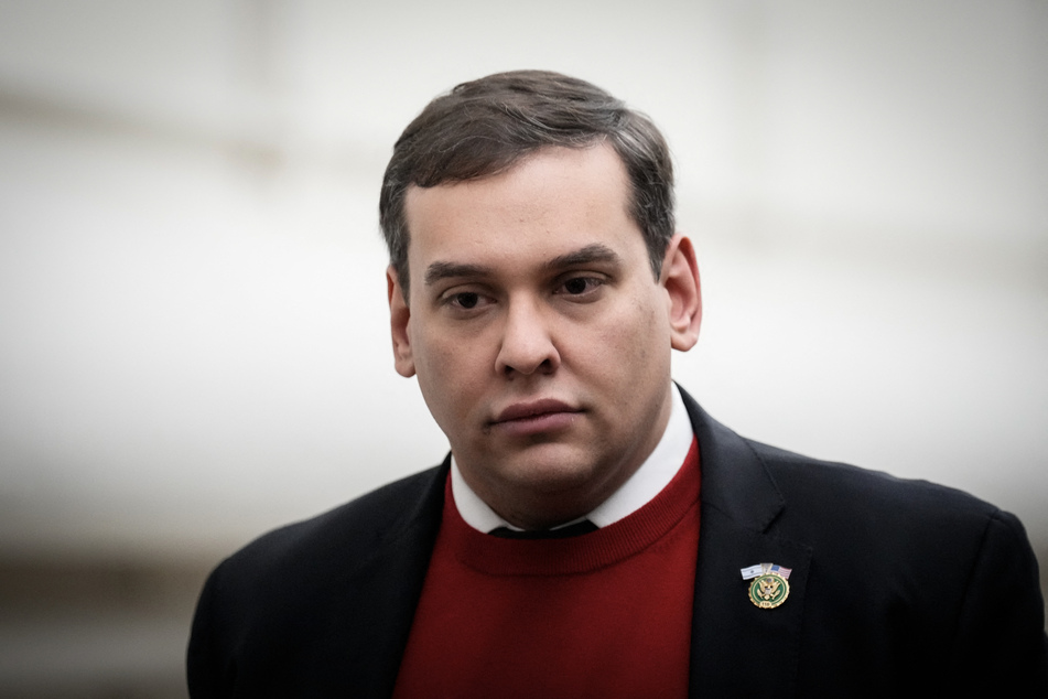 Rep. George Santos (R-NY) walks back to his office after a debate on the House floor on a resolution to expel him from Congress on November 1, 2023.