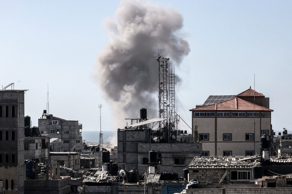 Smoke rises above buildings during Israeli bombardment in Rafah in the southern Gaza Strip.
