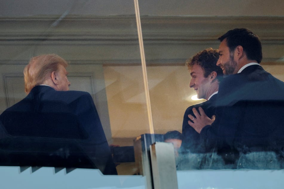 Daniel Penny (c.), who killed Jordan Neely in May 2023, is pictured with President-elect Donald Trump (l.) and Vice President-elect JD Vance in a skybox at the Army-Navy Game on December 14, 2024.