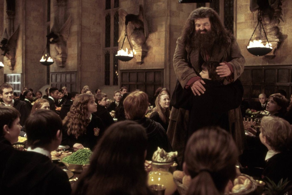 Robbie Coltrane played the fan favorite role of Hagrid (r) in the Harry Potter films.