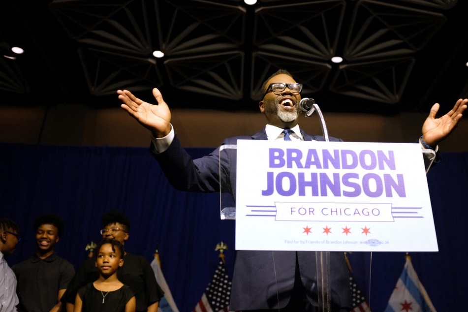 Cook County Commissioner Brandon Johnson celebrates victory in Tuesday's Chicago mayoral runoff election.