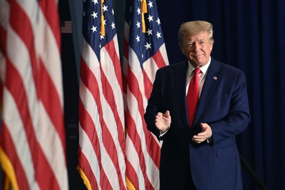 Donald Trump arrives to speak at the America First Policy Institute Agenda Summit in Washington DC.