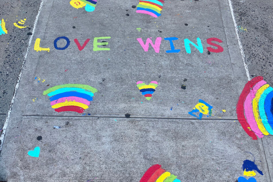 A sidewalk in NYC was decorated with art ahead of Pride Weekend.