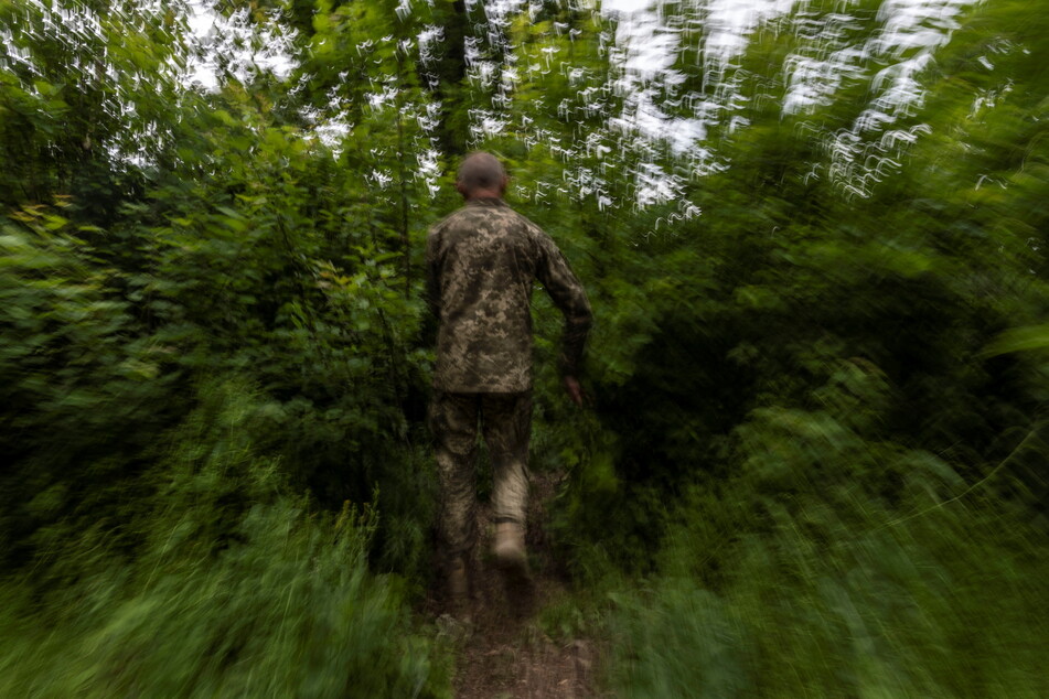 A Ukrainian soldier at an artillery position near Donetsk.