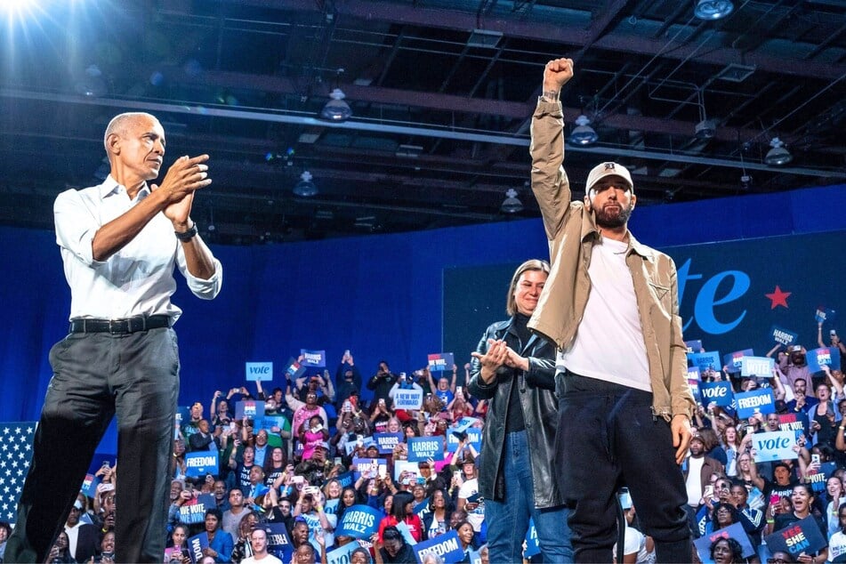 Barack Obama (l.) and rapper Eminem (r.) recently held a campaign rally in support of Kamala Harris in Detroit, and mocked Republican rival Donald Trump.