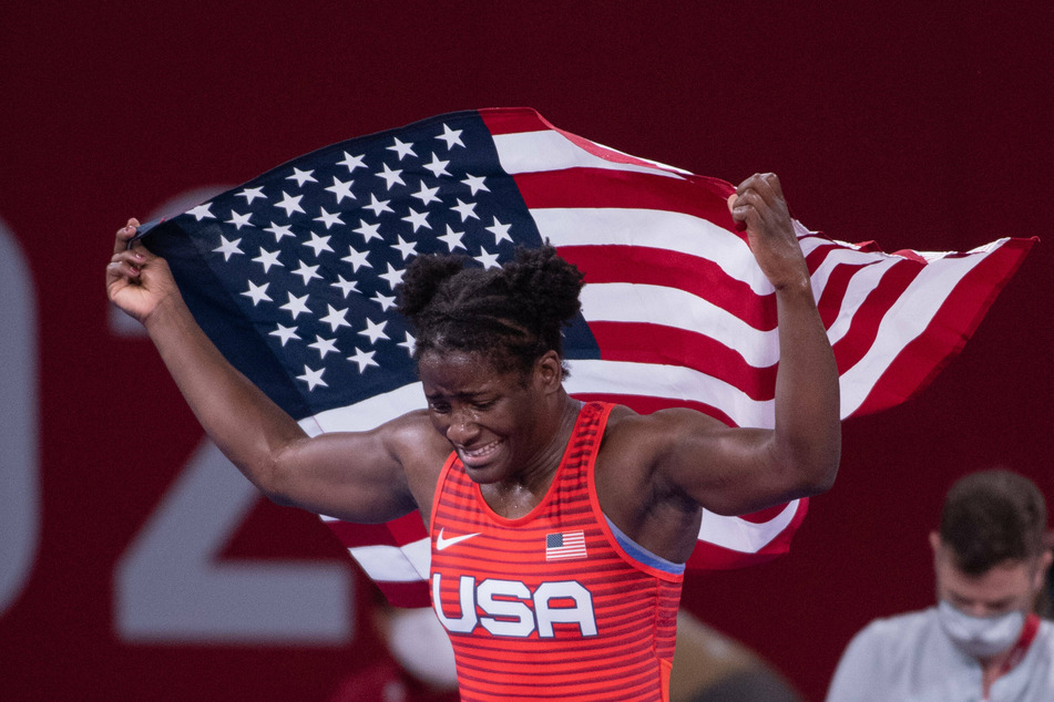 Tamyra Mensah-Stock has made history as the first Black woman to win gold in US women's wrestling.