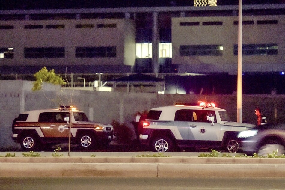 Saudi security forces patrol the area of the US consulate in Jeddah after a security guard and a gunman were both killed in an exchange of gunfire.