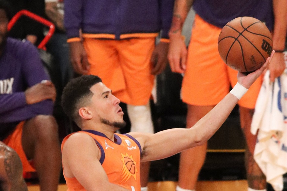 Devin Booker led Phoenix with 24 points on Tuesday night.