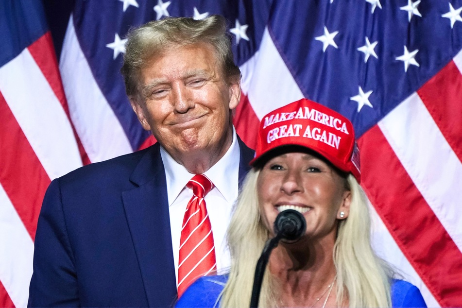 Marjorie Taylor Greene (r.) speaking alongside Donald Trump at a campaign event in Rome, Georgia on March 9, 2024.