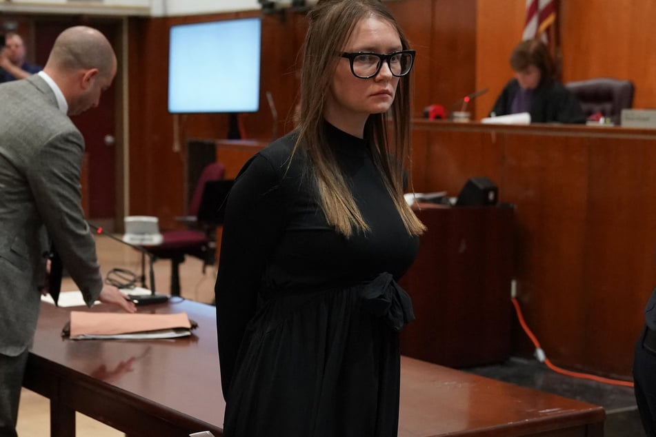 Fake German heiress Anna Sorokin (c.) is led away after being sentenced in Manhattan Supreme Court May 9, 2019 following her conviction on multiple counts of grand larceny and theft of services.