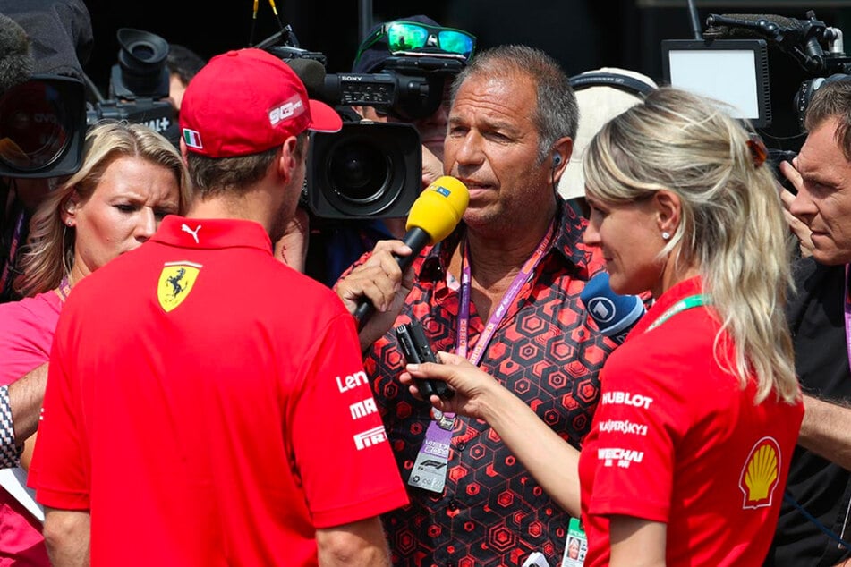 GERMENS Hemd HEXAGON ZINNOBER während der Formel 1 in Hockenheim, Deutschland, 2019. K. Ebel ist im Interview mit Ferrari Rennfahrer Sebastian Vettel.