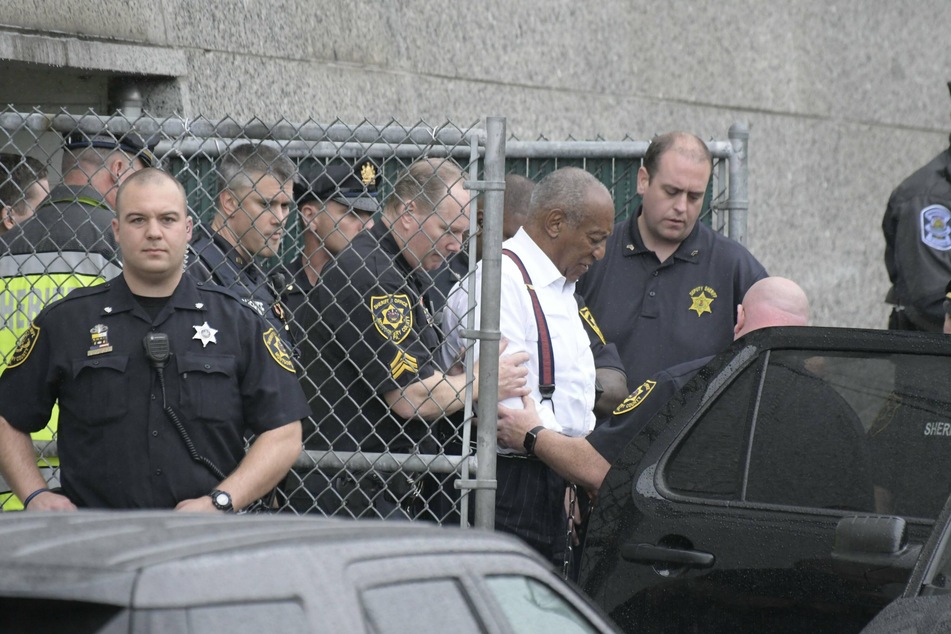 Bill Cosby leaving the Montgomery County Courthouse in handcuffs after his sentencing in 2018.