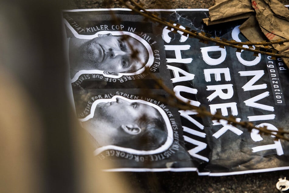 Posters seeking the conviction of Derek Chauvin are plastered along the fencing near the Hennepin County Government Center as well as George Floyd plaza.