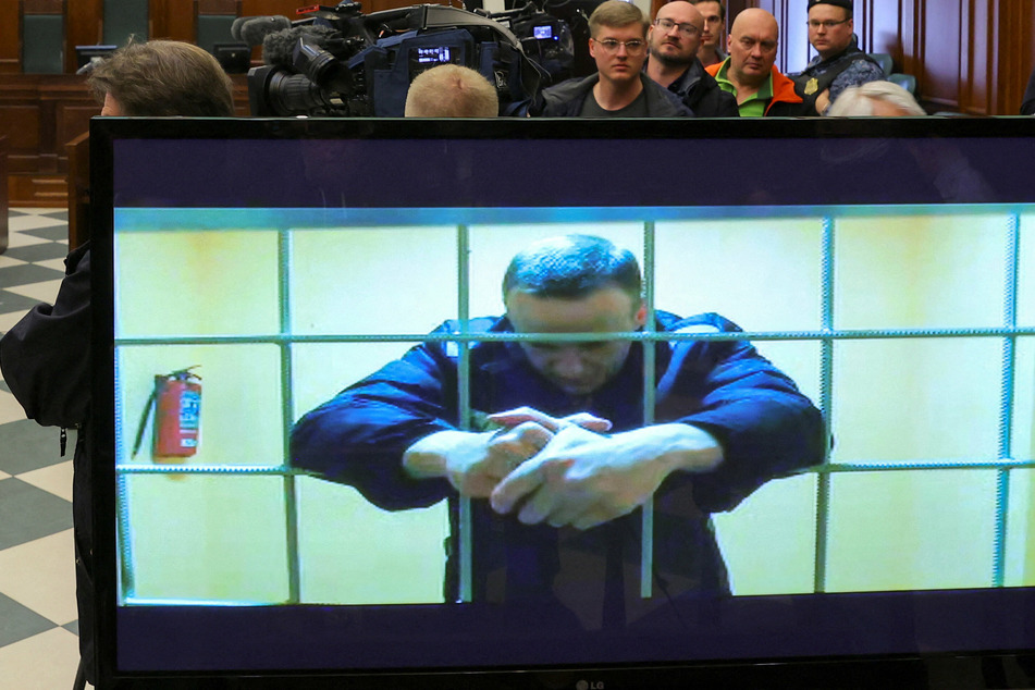Alexei Navalny appearing in court via video link from the Pokrov prison colony.