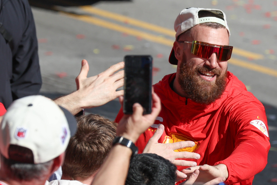Travis Kelce has donated $100,000 to help two young girls who were shot at the Kansas City Chiefs' Super Bowl parade.