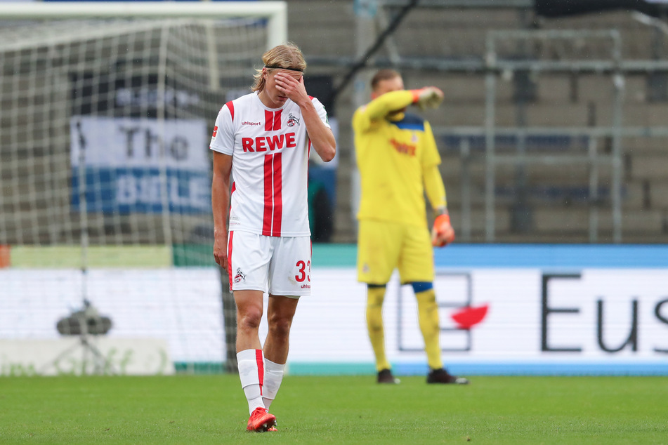 Die Kölner Sebastiaan Bornauw und Torwart Timo Horn zeigen sich enttäuscht nach dem Gegentreffer zum 1:0.