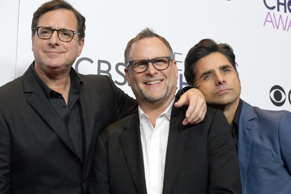 Dave Coulier's (c.) somber news comes two years after his costar Bob Saget's (l.) tragic passing.