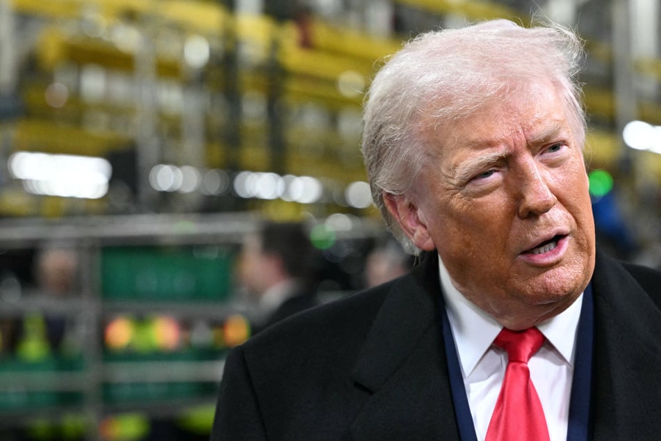 Donald Trump flipped off the Ford worker who heckled him during a visit on Tuesday.