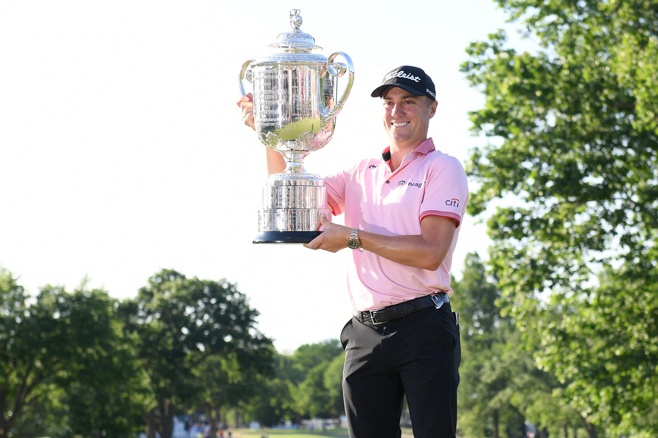 Justin Thomas holds up the Wanamaker Trophy after winning the 2022 PGA Championship.