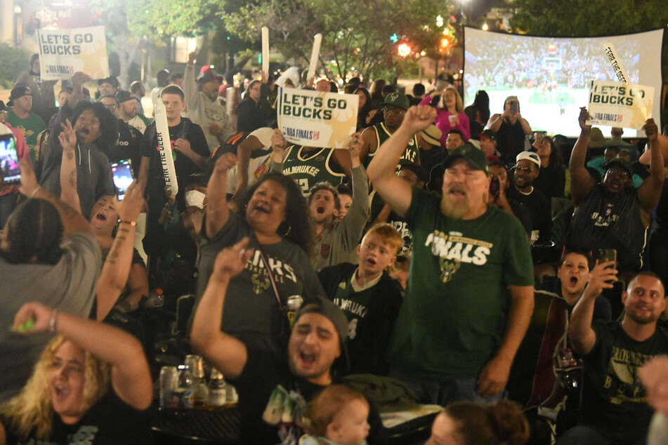 Bucks fans cheer as their team won the 2021 NBA Finals in July.