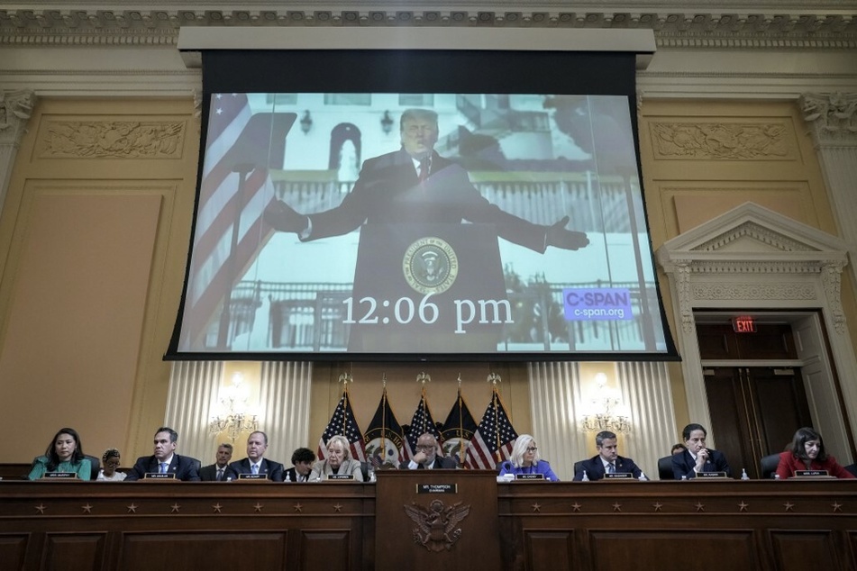 A video of former President Donald Trump speaking on the day of the January 6 attack is shown on a screen during the January 6 hearing.