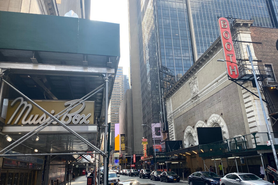 Broadway theaters marquees have been dark since the complete theater industry shutdown in March 2020 due to the pandemic. The Music Box and Booth Theatre on 45th Street have remained shrouded in scaffolding for months.