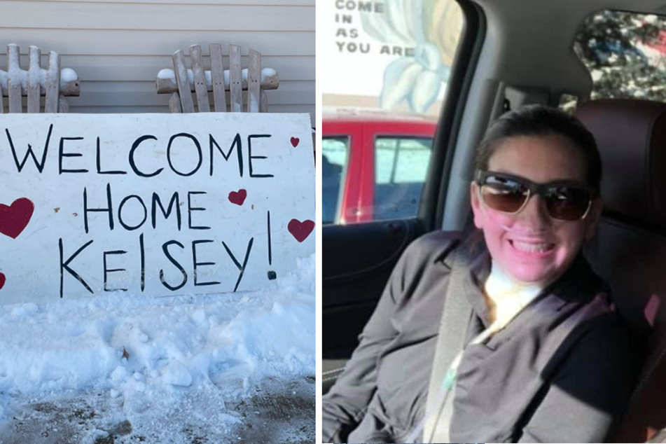 Kelsey Townsend returns home to a welcome sign adorned with hearts.