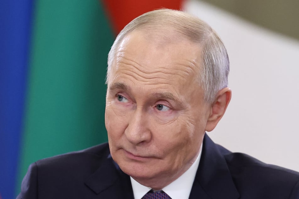 In this pool photograph distributed by Russian state agency Sputnik, Russia's President Vladimir Putin attends the informal summit of Commonwealth of Independent States (CIS) leaders in Saint Petersburg on Sunday.