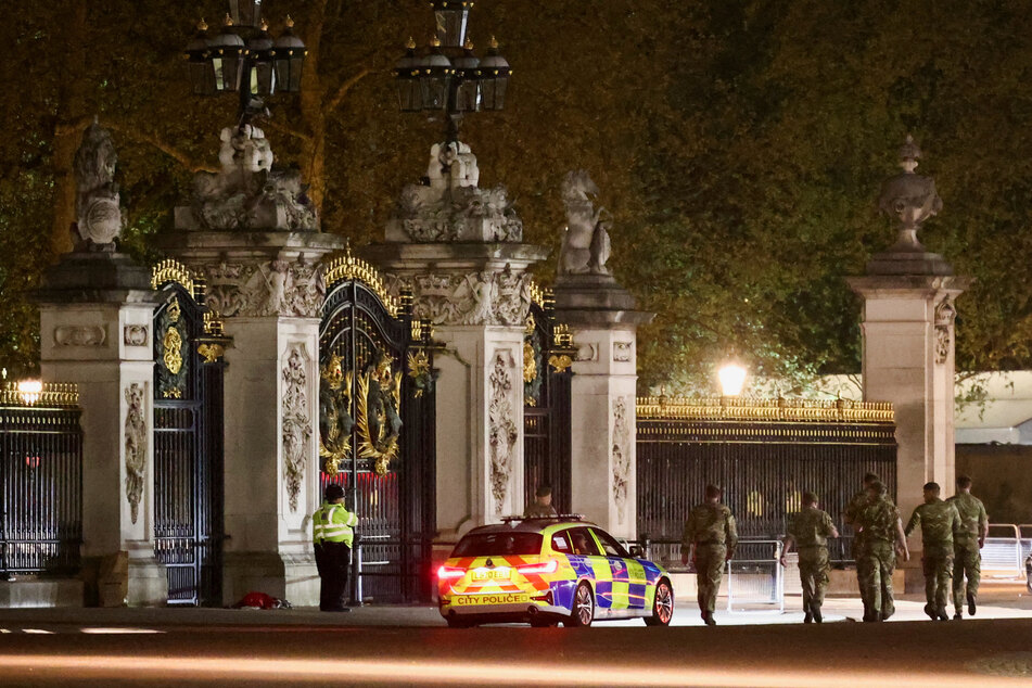 London police carried out a controlled explosion after suspected shotgun cartridges were thrown into the grounds of Buckingham Palace.