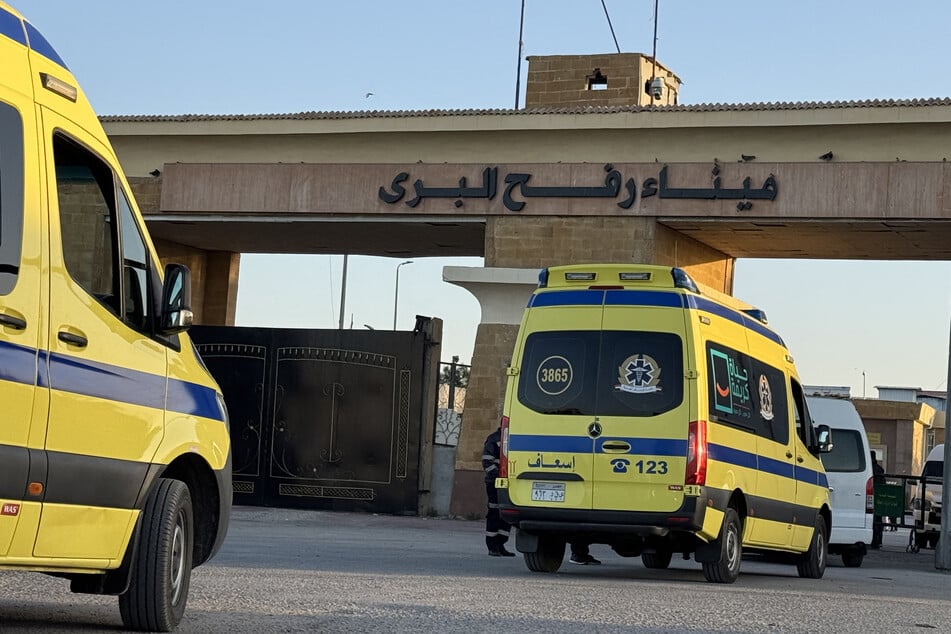 Ambulances wait in line at the Egyptian side of the Rafah border crossing with the Palestinian Gaza Strip on February 2, 2026.