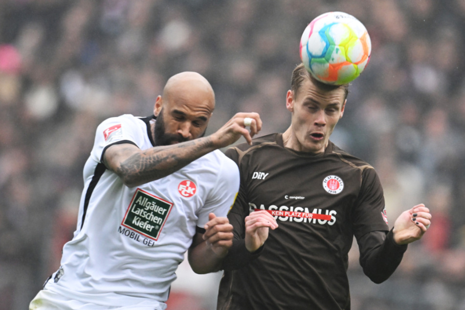Der FC St. Pauli im Eric Smith (26, r) wird sich in der Defensive mit FCK-Stürmer Terrence Boyd (32) auseinandersetzen müssen.