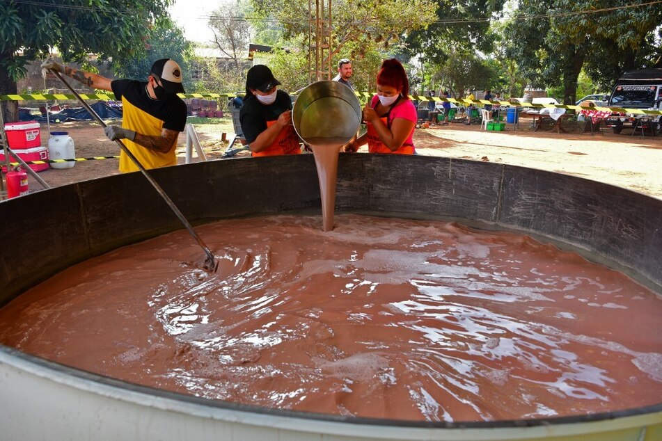 Two people were rescued after falling into a tank of chocolate on Thursday at the Mars Wrigley Confectionery Site factory.