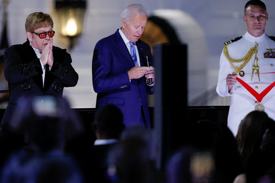 Elton John gets a huge surprise from Biden after White House performance