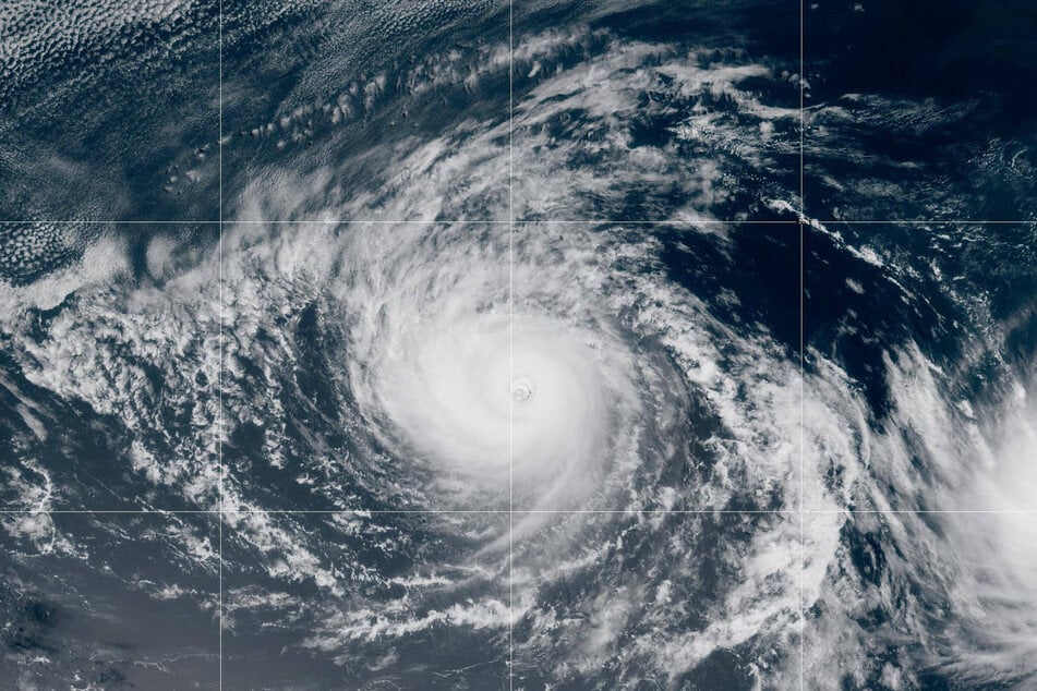 Gilma continues to intensify as a major hurricane over the open waters of the East Pacific.