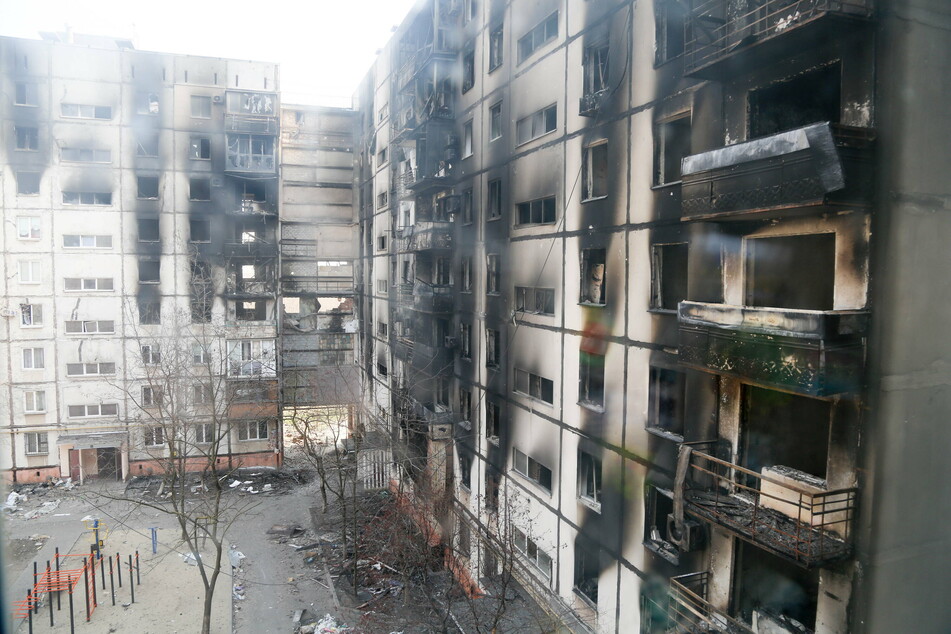 Charred Mariupol residential buildings damaged by the relentless Russian bombing campaign.