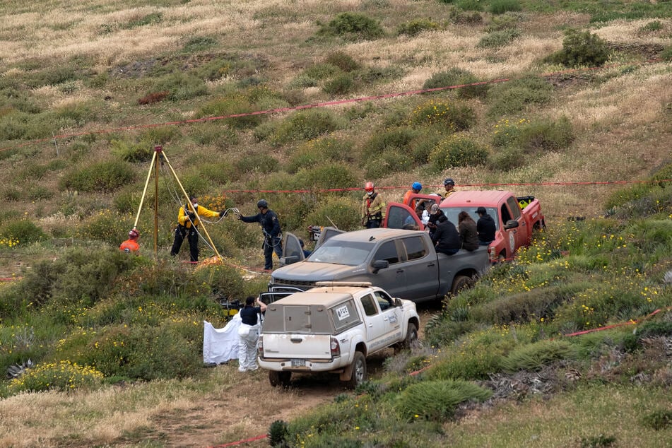 A white pickup truck was discovered in a cliff area in Ensenada, while three Mexican nationals were questioned in relation to the dissappearances.