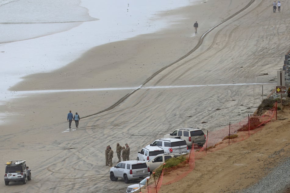 A small boat capsized in waters near San Diego, killing at least three people and leaving seven others missing.