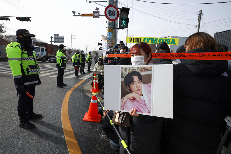 BTS fans gathered at the Yeoncheon army base to show their support for Jin.