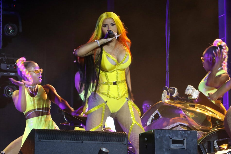 Whether in her music videos or live on stage, Cardi B always puts on a big show.