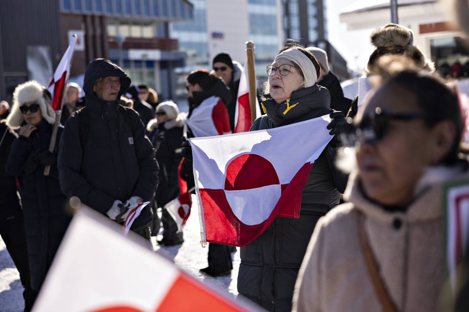 Protesters march to the US Consulate in a demonstration against Donald Trump's takeover threats in Nuuk, Greenland, on March 15, 2025.
