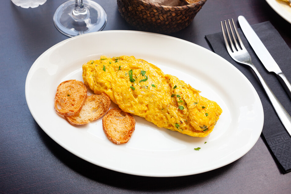 You don't need to make it super pretty, the French omelette is about texture and flavor, not looks.