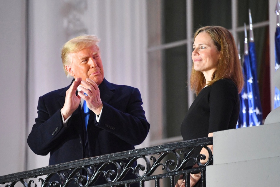 In a recent interview, Supreme Court Justice Amy Coney Barrett (r.) responded to critics who say the court has been ruling in favor of President Donald Trump.